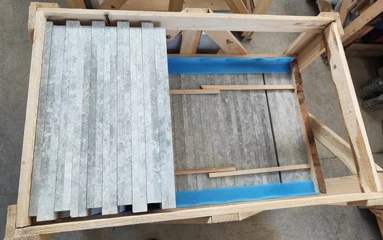 Precision cut natural stone with technical drawing overlay